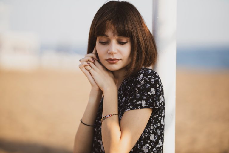 A woman is contemplating whether to tell her partner that she wants an abortion.